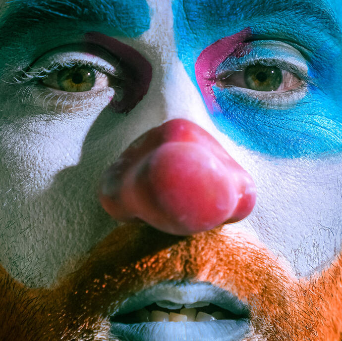 Ryan Pater Clown Close up photo of Ryan Pater wearing clown makeup and red nose